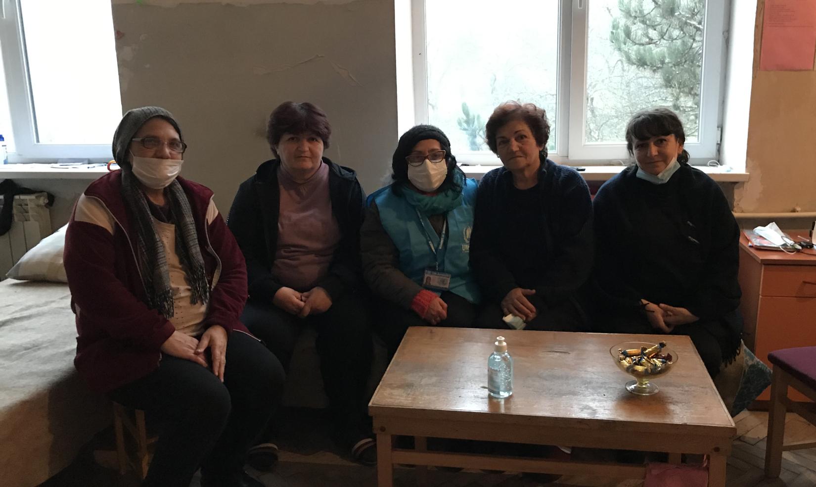 Women in a refugee-like situation share a room in a former boarding school currently used as an emergency shelter in Dilijan, Tavush Province, Armenia.