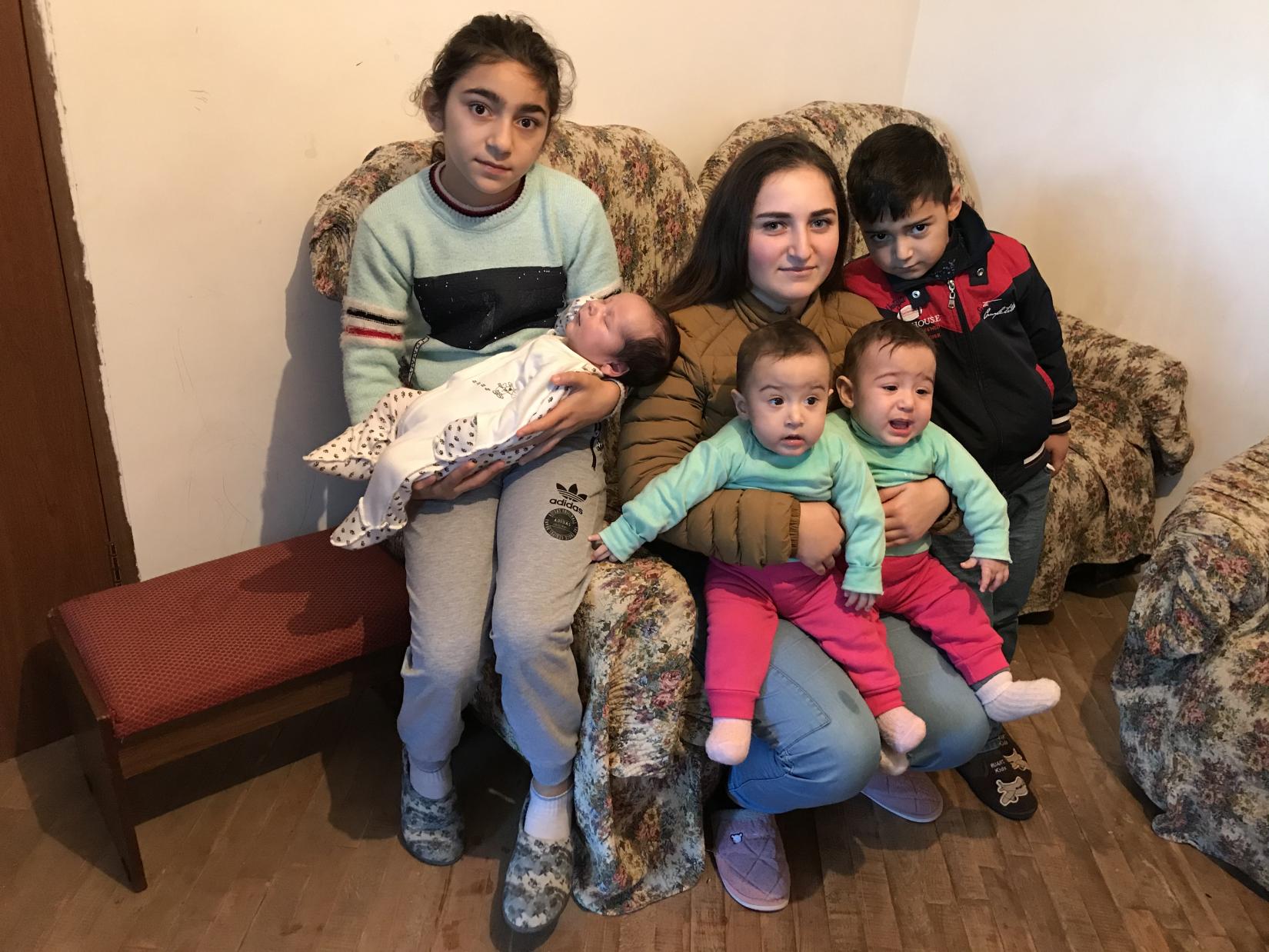 Members of an eighteen-person household in a refugee-like situation are hosted by a local family in a residential building in Kapan, Syunik Province, Armenia.
