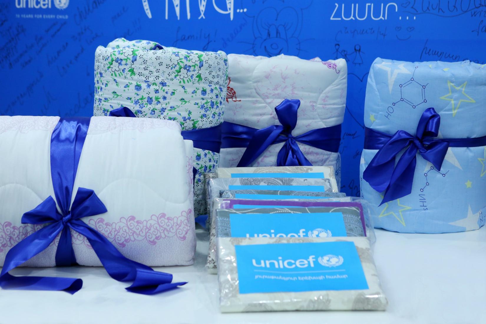 Sets of warm blankets and bed linen provided by UNICEF.