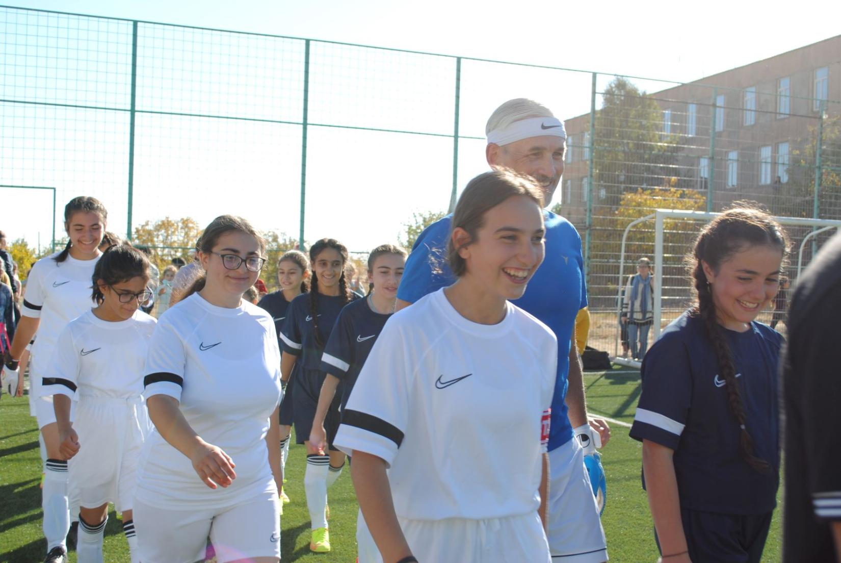 The UN Resident Coordinator in Afrmenia joins the girls' football team of Khachik for a demonstration game.