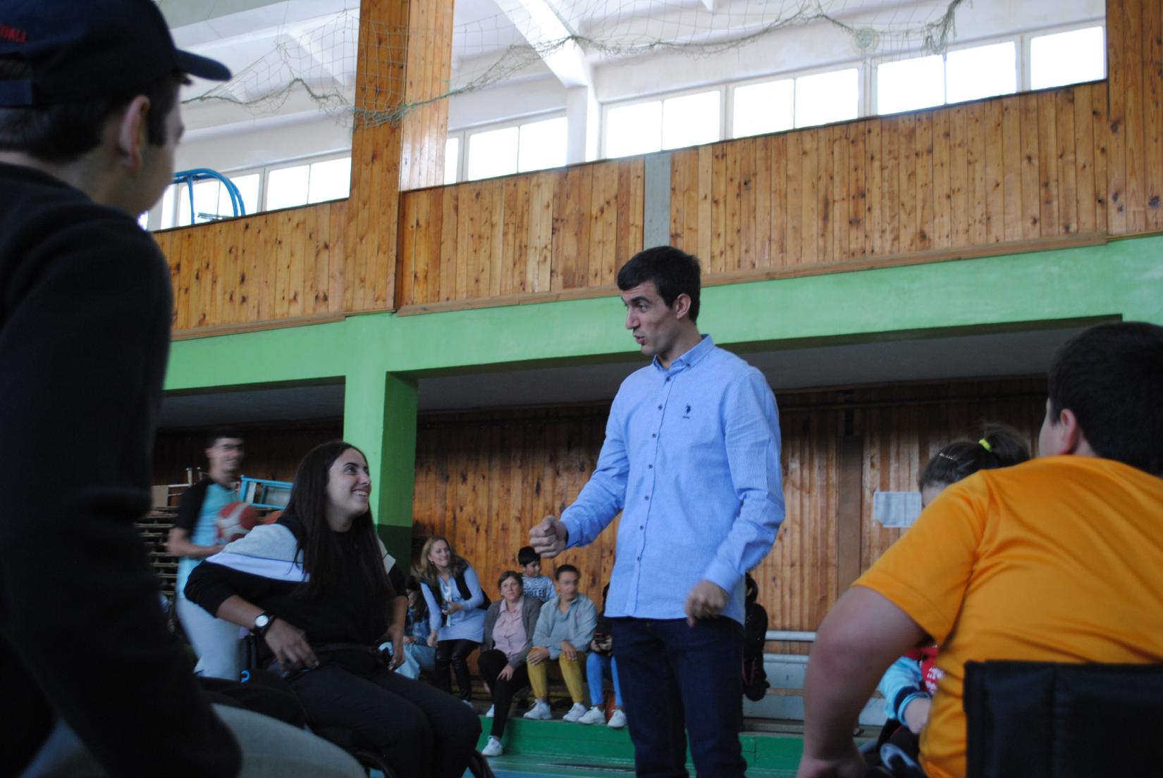 President of the Wheelchair Basketball Federation of Armenia, Harutyun Yesayan gives inspirational speech to the young athletes before the game.