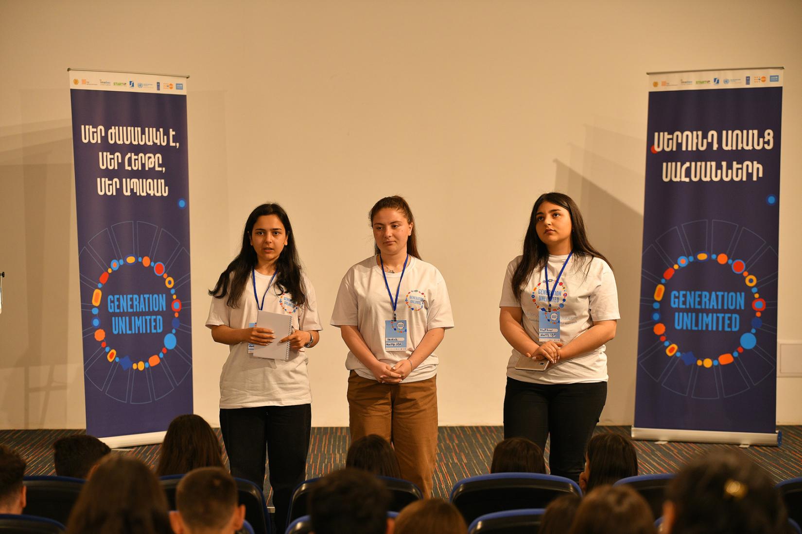 Three participants Generation Unlimited imaGen Ventures Youth Challenge presenting their ideas.