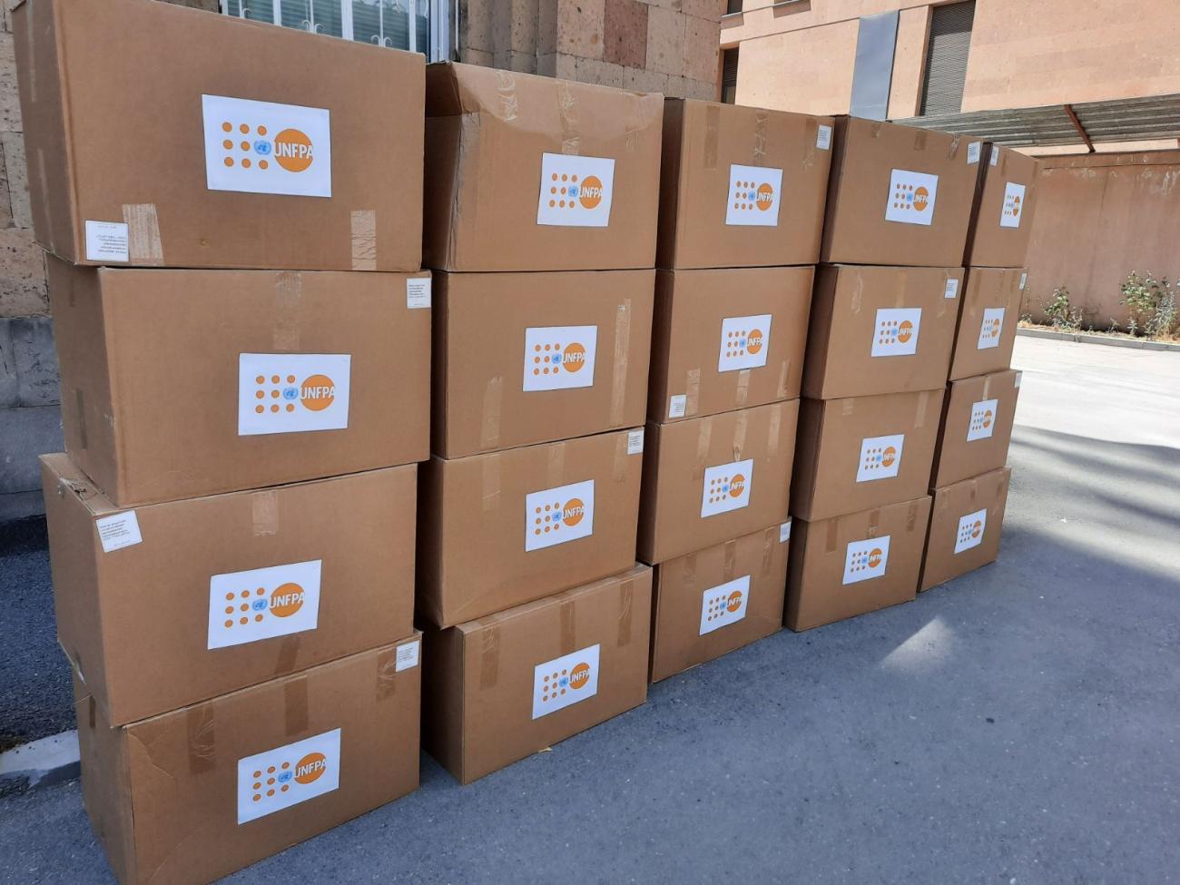 Boxes of PPE provided by UNFPA.
