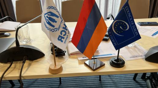 Flags of Armenia, UNHCR and CoE.